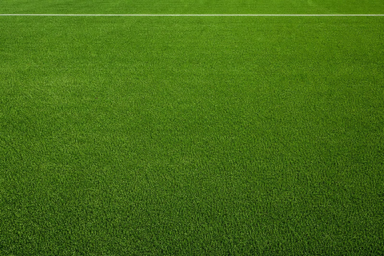 Sports and play area synthetic turf